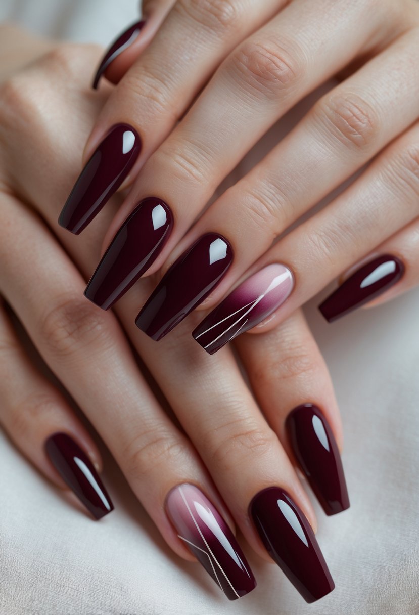Close-up of hands with eight maroon and burgundy French manicured nails arranged in different designs.