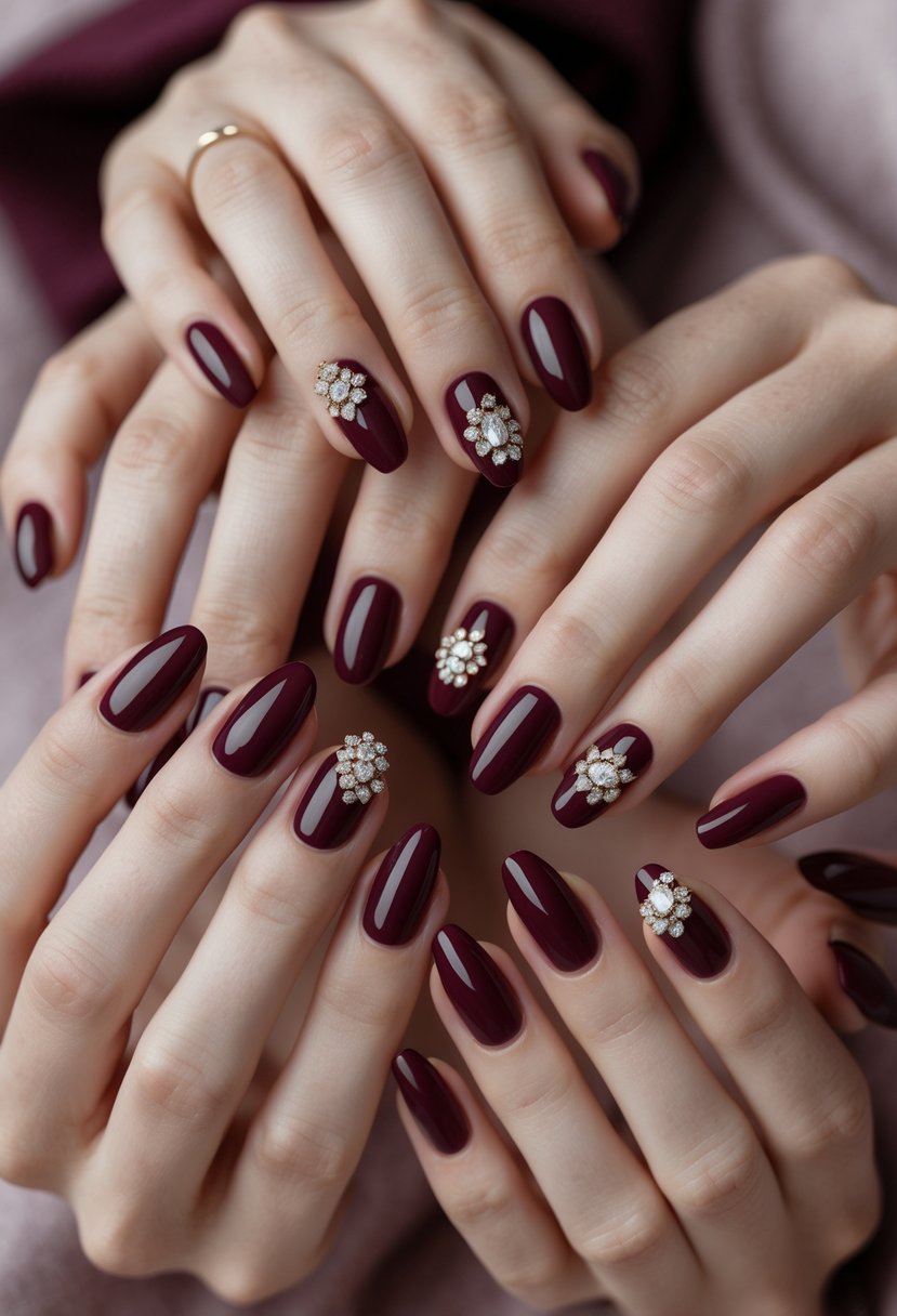 Close-up of eight hands with deep burgundy nails, some decorated with small rhinestones.